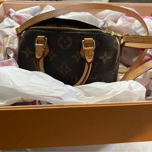 LV NANO SPEEDY. Slightly worn condition in the inside. Box & Dust Bag Included